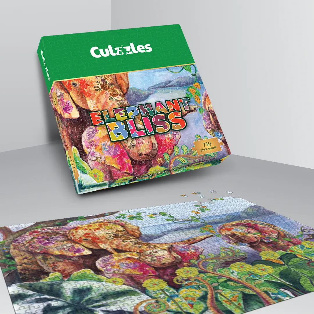 Culzzles Elephant Bliss puzzle box with a partially completed puzzle on a gray surface.
