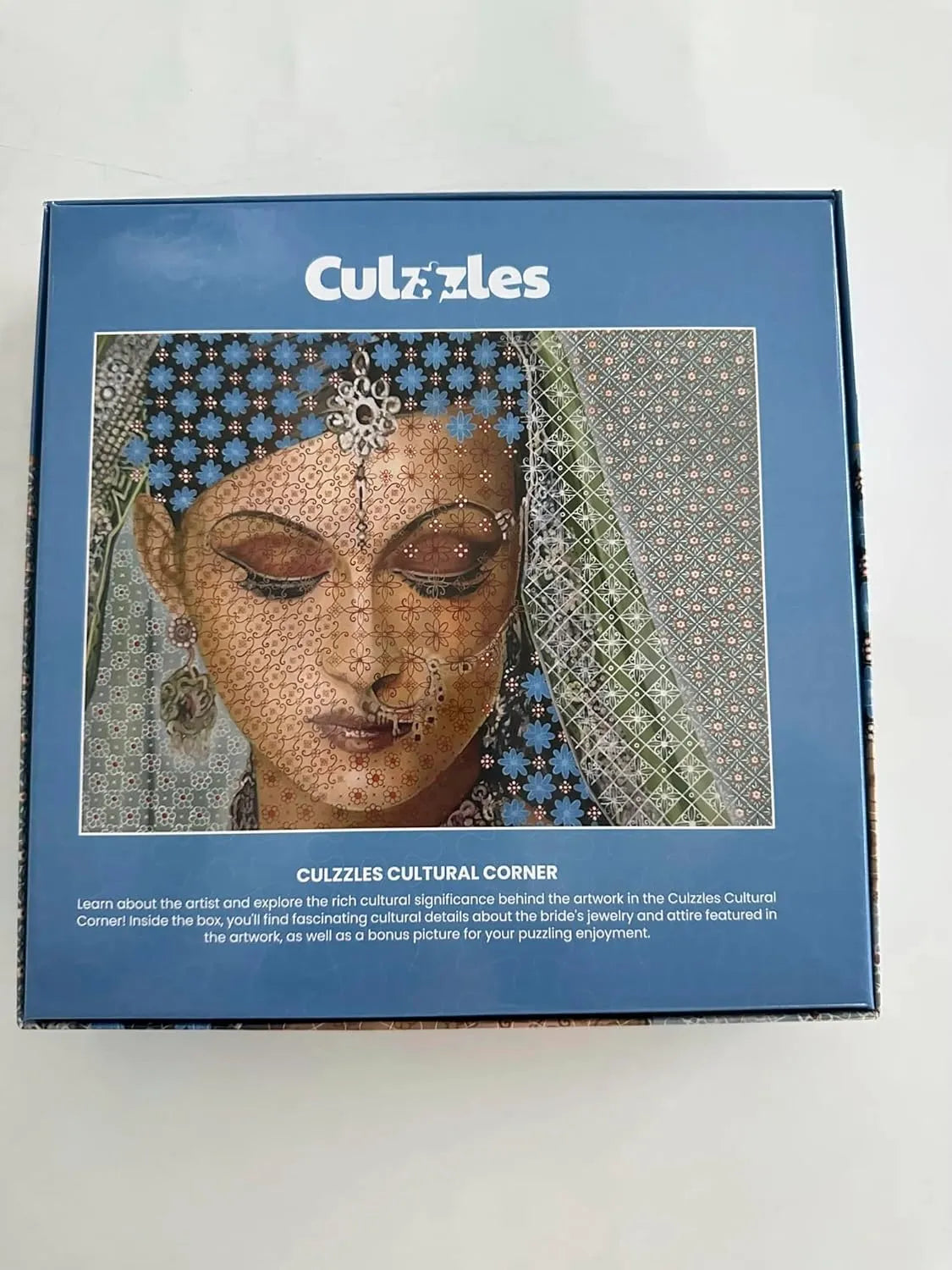 Culzzles puzzle box with a woman's face design on a white background